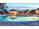 Community pool with lounge chairs and covered patio at 4208 Rosy Billed Ct # 30, Fort Mill, SC 29707