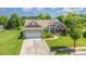 Charming home featuring stone accents, manicured lawn, and attached two-car garage at 4208 Rosy Billed Ct # 30, Fort Mill, SC 29707