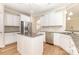 Modern kitchen features white cabinets, stainless steel appliances, and kitchen island at 4208 Rosy Billed Ct # 30, Fort Mill, SC 29707