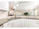 Beautiful kitchen with granite counters, white cabinets, and stainless steel sink at 4208 Rosy Billed Ct # 30, Fort Mill, SC 29707