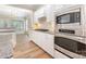 Gourmet kitchen features stainless steel appliances, granite counters, and tiled backsplash at 4208 Rosy Billed Ct # 30, Fort Mill, SC 29707
