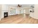 Spacious living room with wood floors, a fireplace, and an open layout at 4208 Rosy Billed Ct # 30, Fort Mill, SC 29707