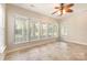 Sunroom with tile flooring and many windows bringing the outdoors in at 4208 Rosy Billed Ct # 30, Fort Mill, SC 29707