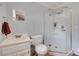 This bathroom has a white shower and vanity at 426 Valley St, Stanley, NC 28164