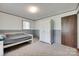 This bedroom has a white bed and a white armoire for storage at 426 Valley St, Stanley, NC 28164