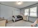 Bedroom featuring light blue walls and luxury vinyl plank flooring at 426 Valley St, Stanley, NC 28164