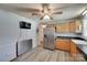 Bright kitchen with modern appliances, including a stainless steel refrigerator and a window at 426 Valley St, Stanley, NC 28164