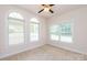 Bedroom with two arched windows at 441 Vermilion Dr, York, SC 29745