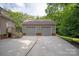 Spacious two-car garage with matching brick facade, accessible via concrete driveway at 441 Vermilion Dr, York, SC 29745