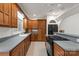 This kitchen features wood cabinets, stainless steel appliances, and a gas cooktop at 441 Vermilion Dr, York, SC 29745