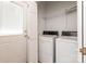Laundry room with washer and dryer, door to outside at 441 Vermilion Dr, York, SC 29745
