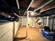 Unfinished basement providing ample storage and utility space with exposed beams at 450 1St Se St, Hickory, NC 28602