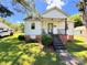 Charming single-story home featuring a cozy front porch and well-maintained lawn at 450 1St Se St, Hickory, NC 28602