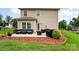 Cozy patio with outdoor seating, barbecue, and well-kept lawn at 611 Sawtooth Oak Dr, Landis, NC 28088