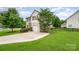 Charming two-story home with attached garage and well-manicured front lawn at 611 Sawtooth Oak Dr, Landis, NC 28088