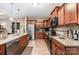 Modern kitchen with stainless steel appliances and hardwood flooring at 611 Sawtooth Oak Dr, Landis, NC 28088