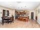 Open floor plan with eat in kitchen, bar seating and stainless appliances at 611 Sawtooth Oak Dr, Landis, NC 28088