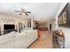 Spacious living room with wood flooring and a seamless open floor plan at 611 Sawtooth Oak Dr, Landis, NC 28088