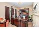 Home office with custom desk and plenty of natural light at 611 Sawtooth Oak Dr, Landis, NC 28088