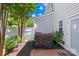 Well-maintained back yard offers a tranquil retreat, with manicured greenery and privacy fence at 6128 Warrior Ave, Fort Mill, SC 29707