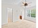 Bright bedroom with a view to the bathroom and walk-in closet, enhancing comfort and convenience at 6128 Warrior Ave, Fort Mill, SC 29707