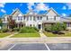Inviting townhomes featuring lush landscaping, and ample parking enhancing community appeal at 6128 Warrior Ave, Fort Mill, SC 29707
