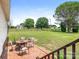 An outdoor patio area with a dining set and large fenced backyard at 7006 Lone Eagle Dr # 18, Monroe, NC 28110