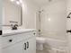 Updated bathroom with a modern vanity, stylish fixtures, and a combined shower and tub at 7006 Lone Eagle Dr # 18, Monroe, NC 28110