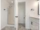 All-white bathroom featuring a glass enclosed shower, modern vanity, and sleek fixtures at 7006 Lone Eagle Dr # 18, Monroe, NC 28110