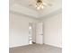 Neutral bedroom features a door to the ensuite bathroom and carpet flooring at 7006 Lone Eagle Dr # 18, Monroe, NC 28110