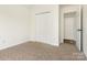 Bedroom with carpet flooring, closet, and natural light at 7006 Lone Eagle Dr # 18, Monroe, NC 28110