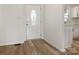 Bright entryway features new flooring and a front door with decorative glass at 7006 Lone Eagle Dr # 18, Monroe, NC 28110