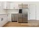 Modern kitchen features stainless steel appliances, sleek white cabinetry, and a stylish countertop at 7006 Lone Eagle Dr # 18, Monroe, NC 28110