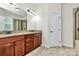 Bathroom with double vanity, granite countertop and access to glass-enclosed shower at 7011 Hyde Park Dr, Indian Trail, NC 28079