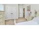 Well-lit bedroom featuring neutral walls, carpet, and ample closet space at 7011 Hyde Park Dr, Indian Trail, NC 28079