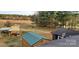 Large lot has barns and a shed plus plenty of room for outdoor enjoyment at 711 Burtonwood Ln, Lincolnton, NC 28092