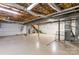 Unfinished basement providing ample space for storage and customization at 8007 Caldwell Rd, Harrisburg, NC 28075