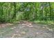 Lot view with wooded area in the backyard at 848 Ike Lynch Rd, Dallas, NC 28034