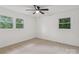 Carpeted bedroom has two large windows that offer a private view of mature trees at 848 Ike Lynch Rd, Dallas, NC 28034