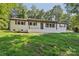 Beautiful white brick home with neat landscaping, offering a welcoming and classic curb appeal at 848 Ike Lynch Rd, Dallas, NC 28034