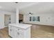 Open-concept living room showcasing an island, fireplace, and natural light at 848 Ike Lynch Rd, Dallas, NC 28034
