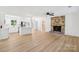 Spacious, modern living space with hardwood floors, brick fireplace, and an open layout perfect for entertaining at 848 Ike Lynch Rd, Dallas, NC 28034