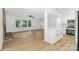 Spacious living room with an open floor plan, new floors, many windows and entry to the kitchen at 848 Ike Lynch Rd, Dallas, NC 28034