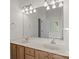 Bathroom featuring a double vanity with a large mirror and great lighting at 9904 Brigstock Ct, Charlotte, NC 28269