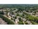 Breathtaking aerial view of the community, featuring lush greenery and a picturesque pond at 110 Whitehall Dr, Mooresville, NC 28117
