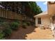 Well-maintained backyard with mature trees, a privacy fence, and space for outdoor activities at 110 Whitehall Dr, Mooresville, NC 28117