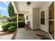 Inviting front porch with seating and an entry to the home, showcasing a cozy entrance at 110 Whitehall Dr, Mooresville, NC 28117