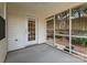 Cozy screened porch with access to the backyard, ideal for relaxing and enjoying the outdoors at 110 Whitehall Dr, Mooresville, NC 28117