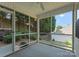 Inviting screened porch with views of the backyard, perfect for outdoor dining and entertaining at 110 Whitehall Dr, Mooresville, NC 28117