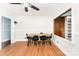 Dining area featuring a wooden table with black chairs and plenty of natural light at 1107 Fairfield Dr, Gastonia, NC 28054